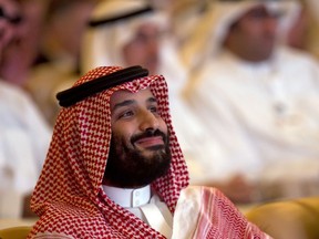 Saudi Crown Prince, Mohammed bin Salman, smiles as he attends the Future Investment Initiative conference, in Riyadh, Saudi Arabia, Tuesday, Oct. 23, 2018.