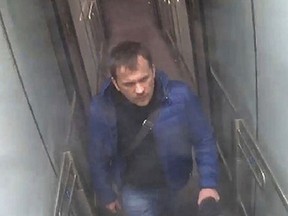 In this file still image taken from CCTV and issued by the Metropolitan Police in London on Wednesday Sept. 5, 2018, shows a man identified as Alexander Petrov at Gatwick airport, England on March 2, 2018.