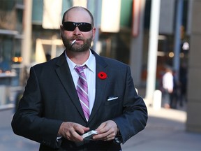 James Robert Farkas leaves the Calgary Court Centre on Oct. 25, 2018. He is charged with criminal negligence in the crash which killed Calgary siblings Ritvik and Rashmi Bale.