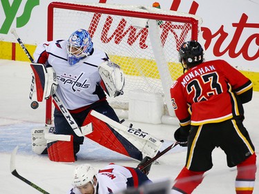 Washington Capitals goaltender Pheonix Copley blocks this Sean Monahan shot during NHL action at the Scotiabank Saddledome in Calgary on Saturday October 27, 2018.