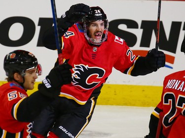 The Calgary Flames' Travis Hamonic celebrates scoring on the Washington Capitals during NHL action at the Scotiabank Saddledome in Calgary on Saturday October 27, 2018.