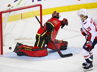 The Washington Capitals' Nicklas Backstrom scores on Calgary Flames goaltender Mike Smith to win a shoot out at the Scotiabank Saddledome in Calgary on Saturday October 27, 2018. The Capitals won the game 4-3.