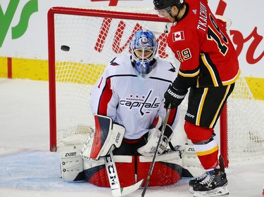 The Calgary Flames' Matthew Tkachuk scores on Washington Capitals goaltender Pheonix Copley to send the game into overtime during NHL action at the Scotiabank Saddledome in Calgary on Saturday October 27, 2018.