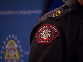 Officers found the victim around 2:30 a.m. Wednesday and arrested multiple suspects from a residence in the northwest community of Brentwood. A Calgary police service emblem is seen on August 31st, 2018. (Zach Laing / Postmedia Network)