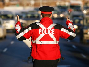 Police will have multiple checkstops scattered around the city and, along with people drinking and driving, officers will also be looking for drivers impaired by recreational cannabis. Here, police conduct a checkstop on Bow Trail.