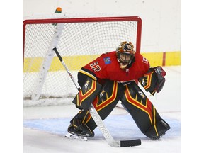 Flames Tyler Parsons minds the net during an NHL pre-season rookie game between the Edmonton Oilers and Calgary Flames in Calgary on Sunday, September 9, 2018. Jim Wells/Postmedia