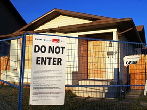 A home on Bedford Court N.E. is boarded up on Monday morning, October 29, 2018 after a cannabis grow operation was discovered in the building on Friday. Gavin Young/Postmedia