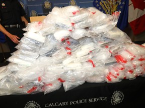 The Calgary Police Service seized a significant amount of drugs and cash, including cocaine and methamphetamine with a street value of approximately $8 million on Oct. 4. Two people have been charged in relation to the investigation on Thursday October 11, 2018. Darren Makowichuk/Postmedia