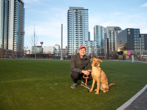 Calgary AB, October 24, 2018. Jesse Vreeken with his rescue dog Billie from https://www.megansrescueefforts.com. in the new East Village Dog ParkPhoto by Don Molyneaux/The Herald.