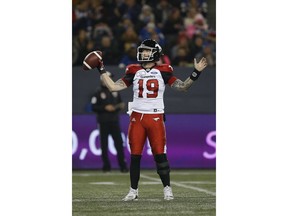 Calgary Stampeders quarterback Bo Levi Mitchell (19) reacts after a penalty is called against the Winnipeg Blue Bombers during CFL action in Winnipeg, Friday.