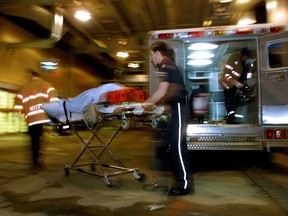 A patient is wheeled into an Edmonton hospital.
