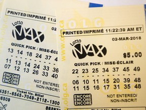 A lotto Max ticket is shown in Toronto on Monday Feb. 26, 2018.