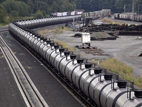 A train loaded with oil sits idle on tracks in Everett, Wash., on Sept. 2, 2014. Alberta Premier Rachel Notley is urging the federal government to increase rail capacity to move more Alberta oil and gas.