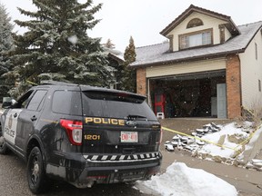 Calgary police investigate a homicide on Signal Hill Circle S.W. on Saturday October 13, 2018. Darren Makowichuk/Postmedia