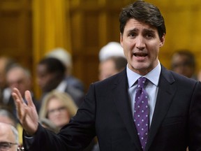 Prime Minister Justin Trudeau stands during question period in the House of Commons on Parliament Hill in Ottawa on Monday, Oct. 22, 2018. (THE CANADIAN PRESS/Sean Kilpatrick)