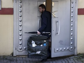 A member of security exits Saudi Arabia's consulate in Istanbul, Friday, Oct. 12, 2018.