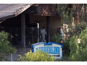 Investigators work at the scene of a mass shooting at the Borderline Bar & Grill in Thousand Oaks, Calif., on Thursday.
