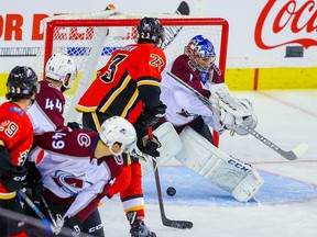 Calgary Flames Sean Monahan scores on Semyon Varlamov of the Colorado Avalanche during NHL hockey at the Scotiabank Saddledome in Calgary on Thursday, November 1, 2018. Al Charest/Postmedia