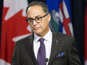 Finance Minister Joe Ceci releases the government's 2018-19 first quarter fiscal update and economic statement on Friday, Aug. 31, 2018 in Edmonton.