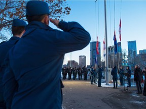 Cadets with 52 City of Calgary Air Cadet Squadron act as the honour guard during the sunset flag lowering ceremony at the Field of Crosses on Wednesday November 7, 2018. Sunrise and sunset flag ceremonies continue through Remembrance Day. Gavin Young/Postmedia