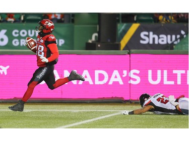 The Calgary Stampeders' Terry Williams runs in the ball for a touch down during the first half of the 106th Grey Cup at Commonwealth Stadium in Edmonton on Sunday November 25, 2018.