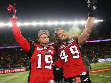 Calgary Stampeders quarterback Bo Levi Mitchell and linebacker Alex Singleton celebrate after winning the Grey Cup defeating the Ottawa Redblacks at Commonwealth Stadium in Edmonton on Sunday November 25, 2018.