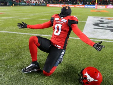 The Calgary Stampeders' Ciante Evans celebrates after the team  defeated the Ottawa Redblacks at Commonwealth Stadium in Edmonton on Sunday November 25, 2018.