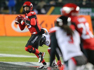 Calgary Stampeders quarterback Bo Levi Mitchell looks for a receiver during Grey Cup action against the Ottawa Redblacks at Commonwealth Stadium in Edmonton on Sunday November 25, 2018.