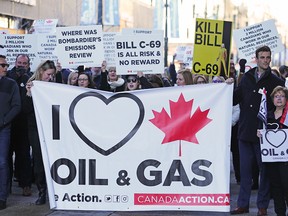 About a thousand Calgarians protested the lack of pipelines outside the Telus Convention Centre on Tuesday November 27, 2018. Finance Minister Bill Morneau was speaking to the Calgary Chamber of Commerce at a luncheon inside the centre. Gavin Young/Postmedia