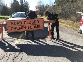 Police have closed a section of McGee Side Road between the 417 and William Mooney Road after a mid-air collision between two planes. and have turned the scene over to investigators from the Transportation Safety Board.