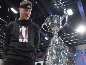 Calgary Stampeders quarterback Bo Levi Mitchell checks out the Grey Cup during media day in Edmonton on  Thursday, Nov. 22, 2018.