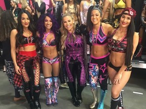 Nattie Neidhart (centre) with Brie Bella, Sasha Banks, Bayley and Nikki Bella backstage at WWE Evolution. (Natalya Neidhart Photo)
