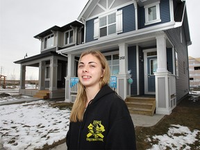 November 13 2018 Cochrane AB - Jack James grade 12 student Jordyn LaPierre poses in front of the Jack James House a Tristan design style Homes by Avi - (Wil Andruschak/Calgary Herald)