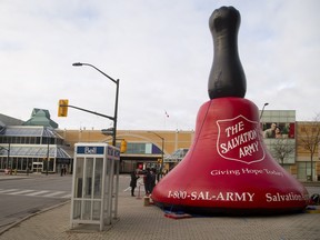 In this 2017 file photo, a big red bell heralds the start of the Salvation Army's kettle campaign in London, Ont.