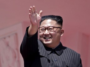 In this Sunday, Sept. 9, 2018 file photo, North Korean leader Kim Jong Un waves after a parade for the 70th anniversary of North Korea's founding day in Pyongyang, North Korea.