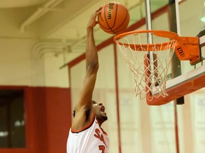 SAIT's Charlie Conner throws down a dunk during Friday's win over Briercrest College.