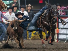 Scott Guenthner rides to victory Sunday at the Canadian Finals Rodeo in Red Deer.