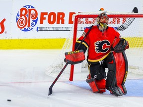 Flames goaltender Mike Smith reacts after giving up a goal to the Colorado Avalanche at the Saddledome on Nov. 1, 2018.