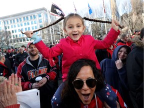 Thousands of fans turned out for a rally celebrating the Calgary Stampeders victory in the 106th Grey Cup outside city hall in Calgary on Tuesday, Nov. 27, 2018.