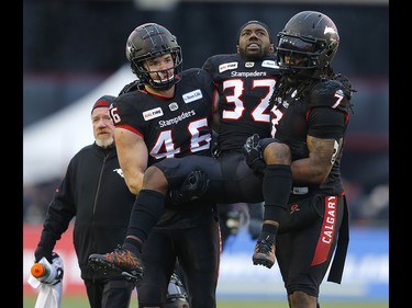 Calgary Stampeders Romar Morris is carried off the field during their game against the Winnipeg Blue Bombers  in the CFL Western Final at McMahon Stadium in Calgary, on Sunday November 18, 2018. Leah hennel/Postmedia