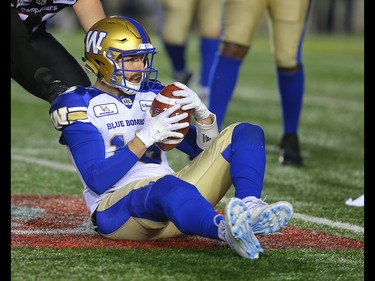 Calgary Stampeders Junior Turner knocks quarterback Matt Nichols of the Winnipeg Blue Bombers to the turf during the 2018 CFL Western Final in Calgary on Sunday, November 18, 2018. Al Charest/Postmedia