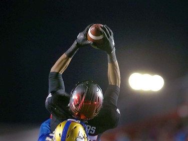 Calgary Stampeders Eric Rogerscatches a late fourth quarter TD in during the CFL Western Final in Calgary at McMahon Stadium on Sunday, November 18, 2018. Jim Wells/Postmedia