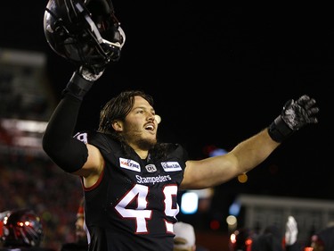 Calgary Stampeders Alex Singleton reacts to their win against the Winnipeg Blue Bombers  in the CFL Western Final at McMahon Stadium  in Calgary, on Sunday November 18, 2018. Leah hennel/Postmedia