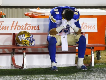 Winnipeg Blue Bombers Andrew Harris reacts after they lost to the Calgary Stampeders in the CFL Western Final at McMahon Stadium against the  in Calgary, on Sunday November 18, 2018. Leah hennel/Postmedia