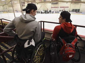 Jacob Wassermann, left, and Ryan Straschnitzki attend the Dallas Stars practice at the University of Denver on Monday, Nov. 26, 2018.