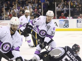 Stockton Heat defenceman Adam Ollas-Mattsson, centre, was wearing an ‘A’ on his No. 34 jersey on Stick It To Cancer Night. The 22-year-old lost his mother, Elisabeth, to cancer. After the game, Ollas-Mattsson’s teammates purchased his game-worn jersey in a live auction and gifted it back to him. (Jack Lima/Stockton Heat)