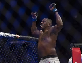 Walt Harris celebrates after defeating Andrei Arlovski in a heavyweight mixed martial arts bout at UFC 232, Saturday, Dec. 29, 2018, in Inglewood, Calif. (AP Photo/Kyusung Gong)