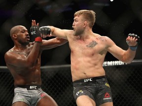 Jon Jones (left) avoids a punch by Alexander Gustafsson of Sweden (right) during a Light Heavyweight titlebout during the UFC 232 event inside The Forum on December 29, 2018 in Inglewood, California.   Jones defeated Gustafsson by KO.