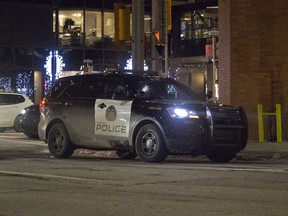 A Calgary police cruiser sits in downtown Calgary after a person attempted to disarm a Calgary police officer on Thursday, Dec. 6, 2018.