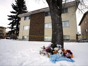 A memorial for two children outside an apartment building at 7920 71 Street, in Edmonton Friday Dec. 7, 2018. Photo by David Bloom